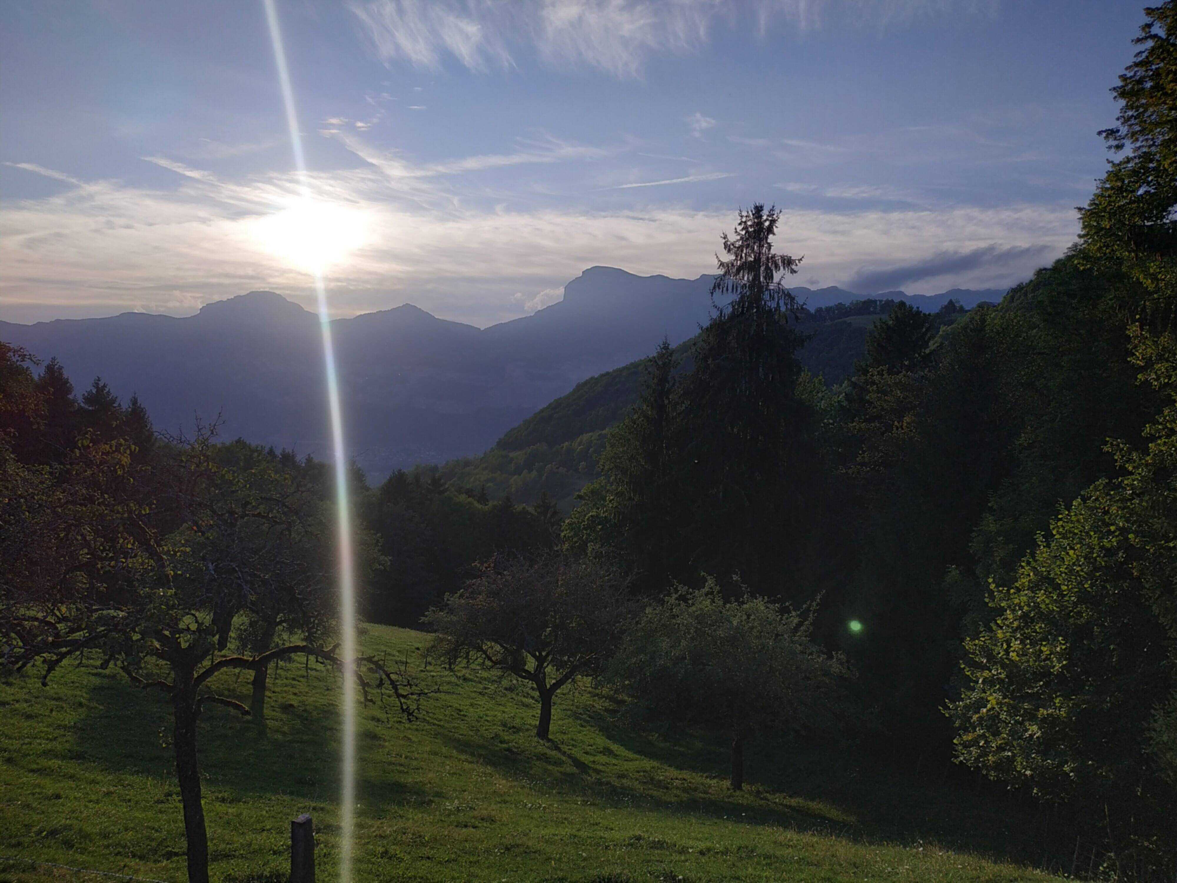 The sun setting over Grenoble